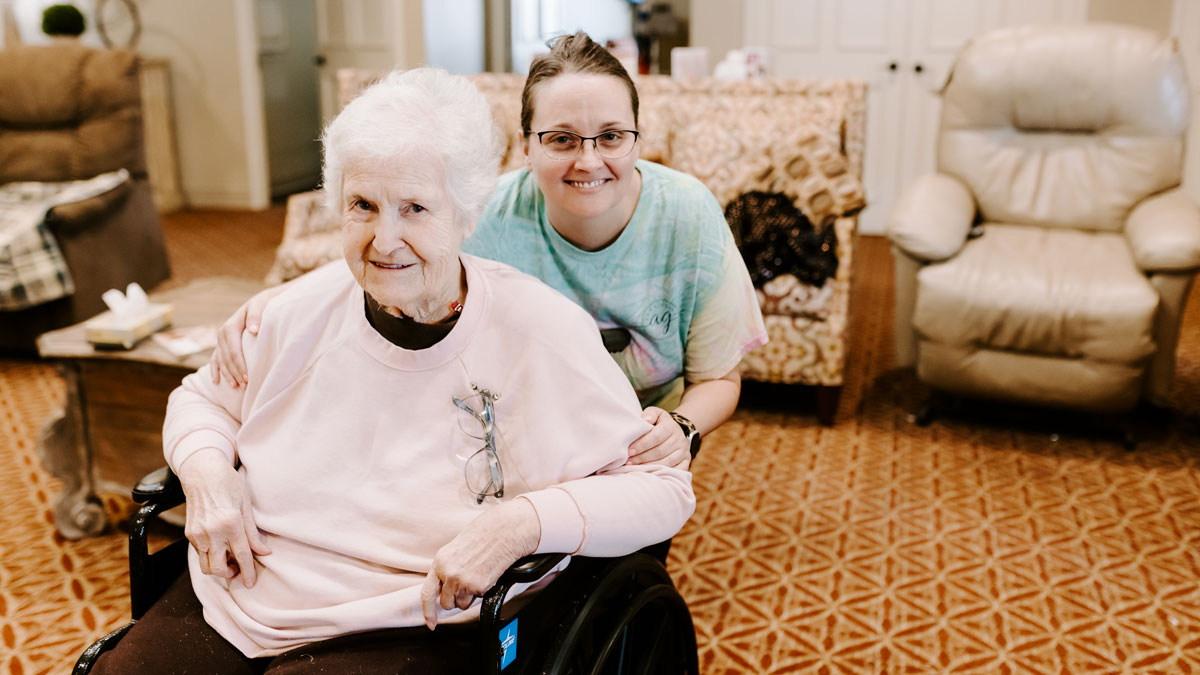 Happy Elder and Staff Member at Green House Cottages of Belle Meade